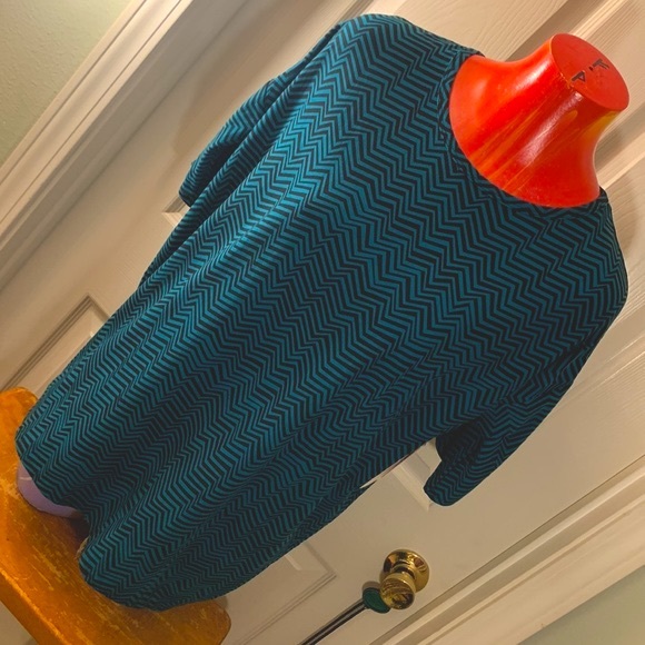 LuLaRoe Tops - LULAROE Irma Turquoise Wicked Design Top NWT